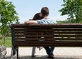 Young couple on bench Royalty Free Stock Photo