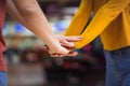 Young couple in bowling alley. Holding hands Royalty Free Stock Photo