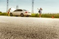 Young couple traveling on the car in sunny day