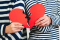 Young couple with broken heart, close up. Unrequited love. Broken heart. Love and relationship problems concept. Man and woman Royalty Free Stock Photo