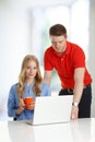 Young couple browsing together on a laptop