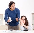 Young couple in budget planning concept