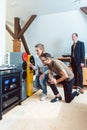 Young couple buying high-end stereo equipment in store Royalty Free Stock Photo