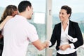 Young couple buying new home with estate agent Royalty Free Stock Photo