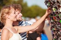 Young couple buying new sunglasses outdoor Royalty Free Stock Photo