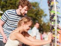 Young couple buying new sunglasses outdoor Royalty Free Stock Photo