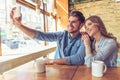 Young couple in the cafe Royalty Free Stock Photo