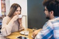 Couple in cafe enjoying the time spending with each other Royalty Free Stock Photo