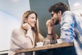 Couple in cafe enjoying the time spending with each other Royalty Free Stock Photo