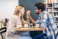 Couple in cafe enjoying the time spending with each other Royalty Free Stock Photo