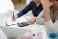 Young couple calculating their budget for new house. Royalty Free Stock Photo