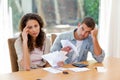 Young couple calculating their domestic bills Royalty Free Stock Photo