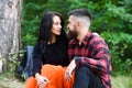 Young couple with calm faces have rest after hiking