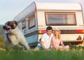 Young couple with a camper van