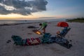 Young couple and campfire on beach in Everglades National Park, Florida. Royalty Free Stock Photo