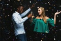 Young couple celebrating birthday at night club Royalty Free Stock Photo