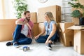 Young couple celebrating moving to new home Royalty Free Stock Photo