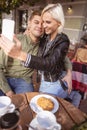 Young couple celebrating their anniversary in the cafe Royalty Free Stock Photo