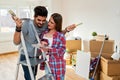 Young Couple Choosing Colors for Painting their Home Royalty Free Stock Photo