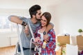 Young Couple Choosing Colors for Painting their Home Royalty Free Stock Photo