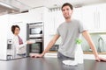 Young Couple Cleaning Modern Kitchen Royalty Free Stock Photo