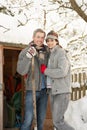 Young Couple Clearing Snow From Path Royalty Free Stock Photo