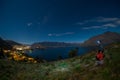 Night scene of young couple view queenstown, new zealand.