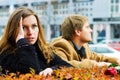 Young fashion couple in conflict on a city street Royalty Free Stock Photo