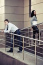 Young couple in conflict at office building