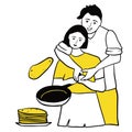 Young couple cooking together in the kitchen. Man and woman bake blinis and pancakes. Love and relationships, working together Royalty Free Stock Photo