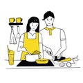 Young couple cooking together in the kitchen. Woman cooks spaghetti for pasta, man chops vegetables. Love and relationships, Royalty Free Stock Photo