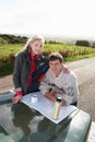 Young couple on country drive Royalty Free Stock Photo