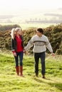 Young couple on country walk Royalty Free Stock Photo