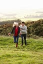 Young couple on country walk Royalty Free Stock Photo