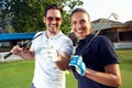 Couple at the course playing golf and looking happy Royalty Free Stock Photo