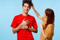 young couple cropped view studio blue background communication Royalty Free Stock Photo