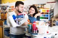 Couple in paint supplies store Royalty Free Stock Photo