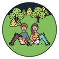 Young couple with cute cats mascots on the park Royalty Free Stock Photo