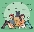 Young couple with cute cats mascots Royalty Free Stock Photo