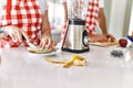 Young couple cutting banana at kitchen Royalty Free Stock Photo