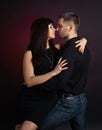 Young couple dancing on a dark background Royalty Free Stock Photo