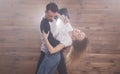 Young couple dancing latin dance bachata, merengue, salsa, kizomba. Two expressive pose