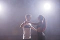 Young couple dancing latin dance Bachata, merengue, salsa. Two elegance pose in dance class