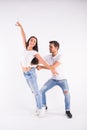 Young couple dancing social latin dance bachata, merengue, salsa. Two elegance pose on white background Royalty Free Stock Photo