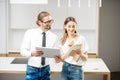 Couple planning home interior in the kitchen Royalty Free Stock Photo