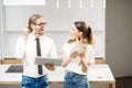 Couple planning home interior in the kitchen Royalty Free Stock Photo