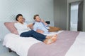 young couple with different hobbies Royalty Free Stock Photo