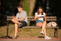 Young couple distracted with communication technology tablet and Royalty Free Stock Photo