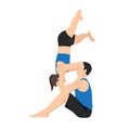 Young couple doing acro yoga. Acro yoga concept. Pair yoga. Yoga flexibility class workout Royalty Free Stock Photo