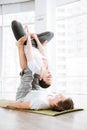 Young couple doing acro yoga exercises Royalty Free Stock Photo